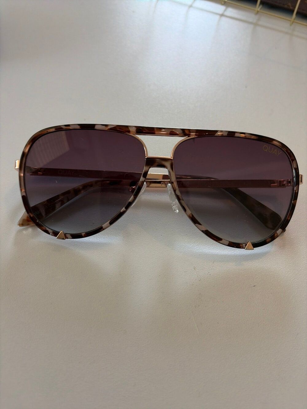 Quay High Profile polarized aviators featuring a dark tortoiseshell frame